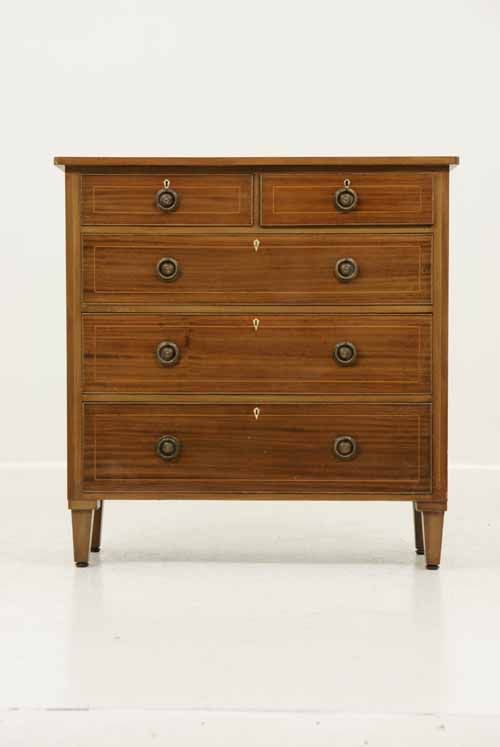 This dresser is made of solid mahogany in its original finish. The 