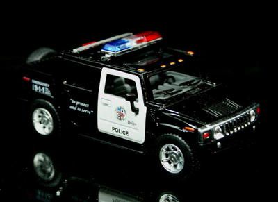 2005 Hummer H2 SUT POLICE Diecast 140 Scale  