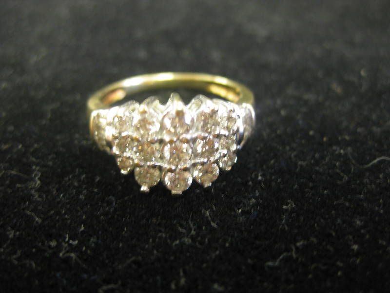 10k cluster ring with baguettes and round diamonds sz 7  