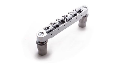 This is a chrome bridge for a Les Paul or similar type guitar. These 