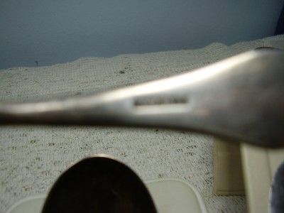 place setting which includes, soup spoon, teaspoon, fork, and butter 