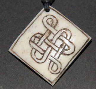 TIBETAN CARVED YAK BONE ETERNAL KNOT PENDANT  