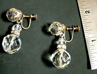   lead crystal drop earrings and a necklace with a crystal pendant in